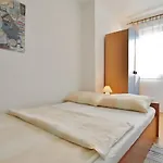 Апартаменты With Parking Space Barbat, Rab - 24547 Раб